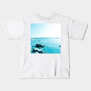 A rocky seaside in Oman bluish version Kids T-Shirt